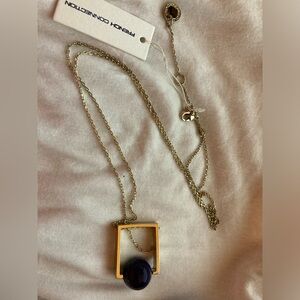 Modern Geometric Pendant Necklace from French Connection